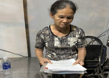 (1) Hình 1 Bà Lý Người Bảo Lãnh Cho Hợp đồng Mua Bán